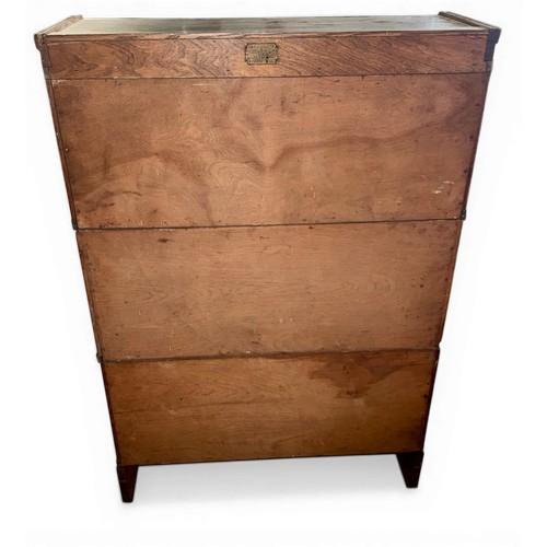 27 - A three height oak Inglesants sectional bookcase. 87cm w x 31cm d x 130cm h.