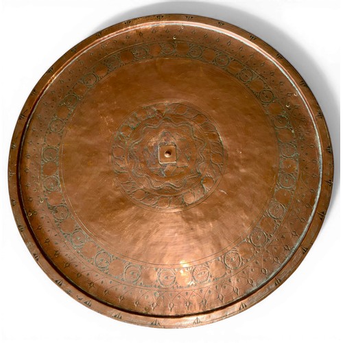 29 - A circular copper topped table on later metal base. 80cm d x 39cm h.