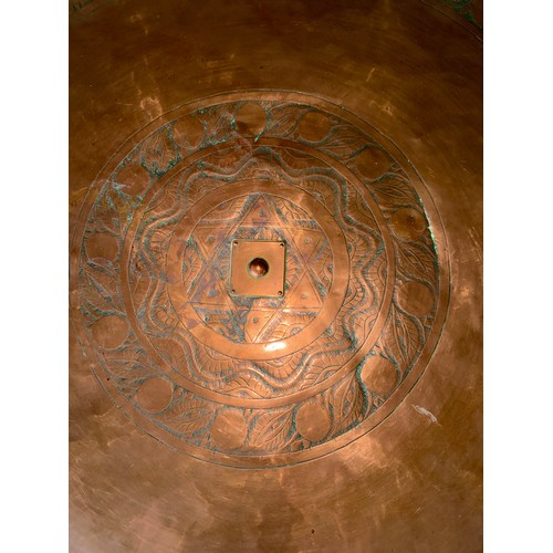 29 - A circular copper topped table on later metal base. 80cm d x 39cm h.