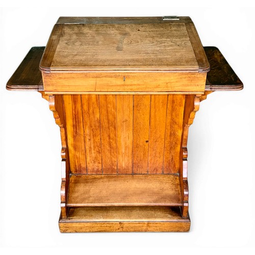 32 - A 19thC mahogany school desk with cupboard to back and inkwell to the top marked E.S.A. 42A Holborn ... 