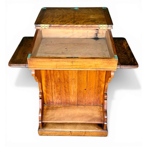 32 - A 19thC mahogany school desk with cupboard to back and inkwell to the top marked E.S.A. 42A Holborn ... 