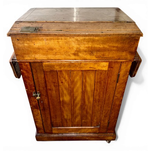 32 - A 19thC mahogany school desk with cupboard to back and inkwell to the top marked E.S.A. 42A Holborn ... 