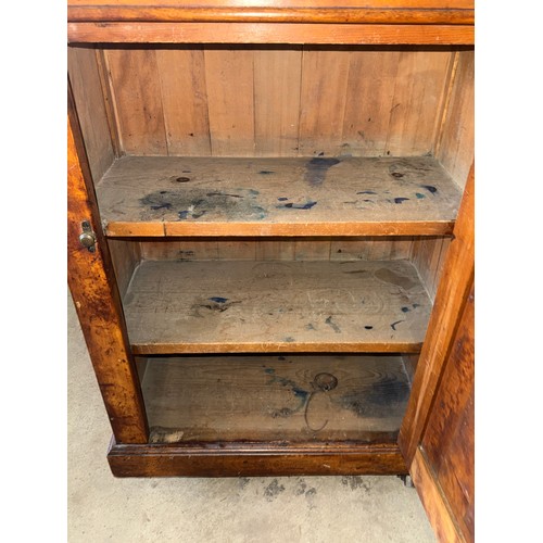 32 - A 19thC mahogany school desk with cupboard to back and inkwell to the top marked E.S.A. 42A Holborn ... 