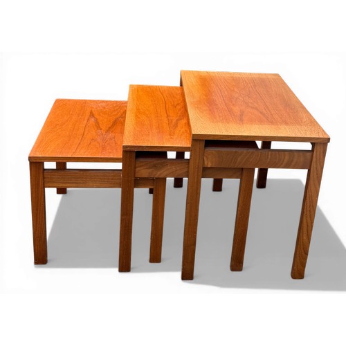 34 - A nest of three teak tables. Largest 54cm w x 36cm d x 47cm h.