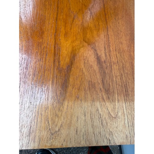 34 - A nest of three teak tables. Largest 54cm w x 36cm d x 47cm h.