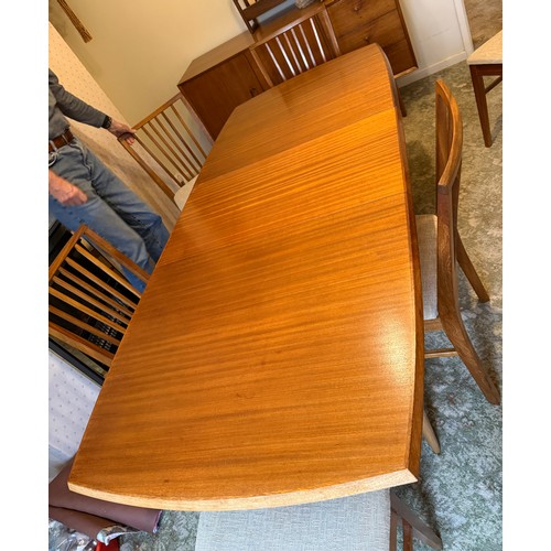 40 - A mid 20thC Vanson teak extending dining table and six chairs. Closed 139 x 82w, extended 181cm l.