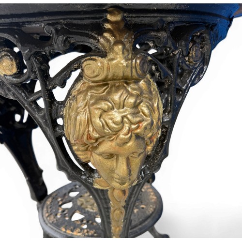 47 - A painted cast iron pub table marked Gaskell & Chambers Ltd, 18 Briggate, Leeds. Decorated with cast... 