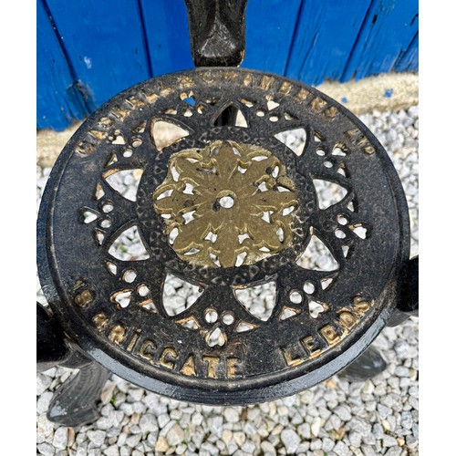 47 - A painted cast iron pub table marked Gaskell & Chambers Ltd, 18 Briggate, Leeds. Decorated with cast... 