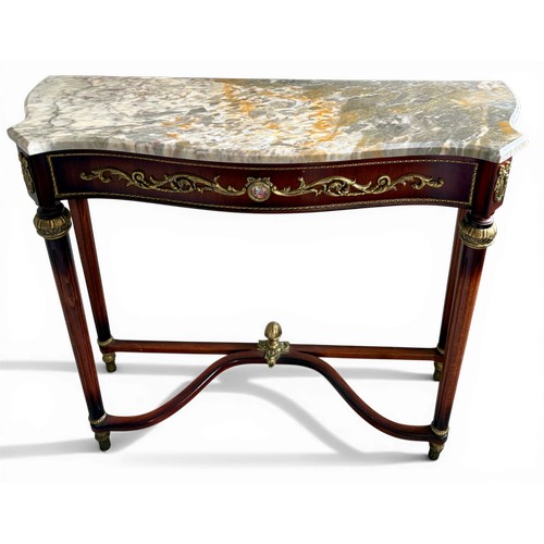 49 - A 20thC marble topped mahogany console table with gilt metal and porcelain mounts. 89 w x 31 d x 76c... 