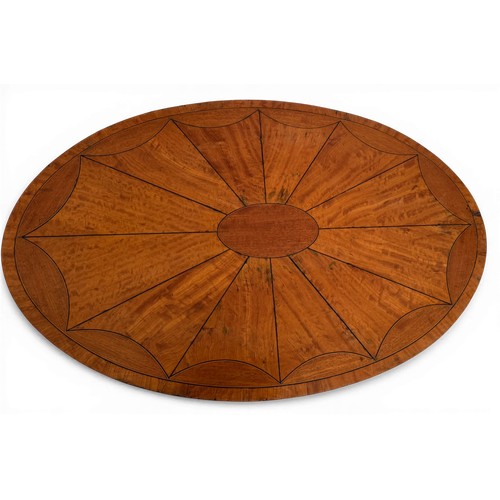 54 - An Edwardian oval satinwood side table. 74 w x 48 d x 71cm h.