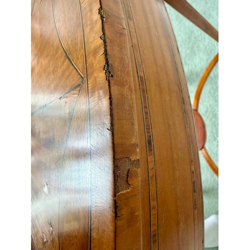 54 - An Edwardian oval satinwood side table. 74 w x 48 d x 71cm h.