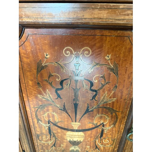 57 - An inlaid satinwood two door cabinet with 2 drawers to top. 80 x 42 x 76cm h.