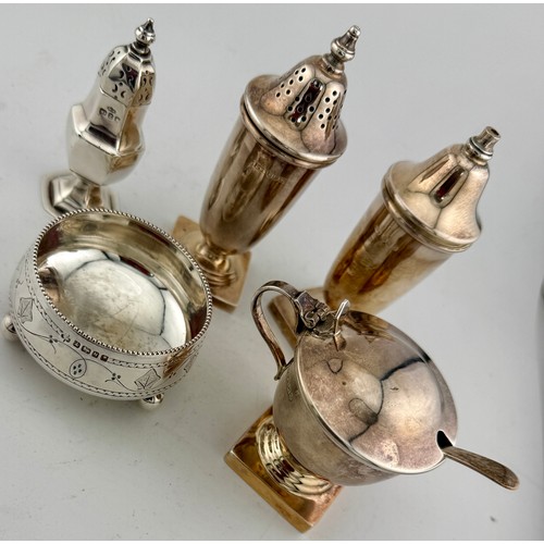 495 - Five various hallmarked silver condiments pieces to include mustard, salts and pepper pots. Various ... 