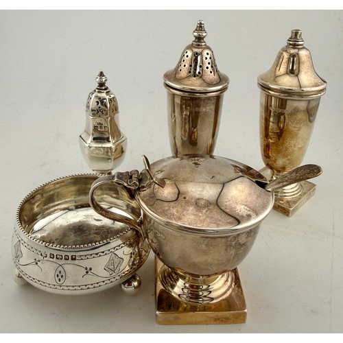 495 - Five various hallmarked silver condiments pieces to include mustard, salts and pepper pots. Various ... 