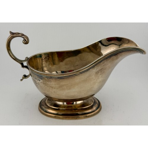499 - Hallmarked silver sauce boat, Sheffield 1909, maker John Sanderson & Son Ltd. Weight 283gm.