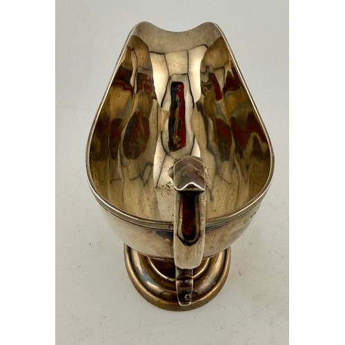 499 - Hallmarked silver sauce boat, Sheffield 1909, maker John Sanderson & Son Ltd. Weight 283gm.