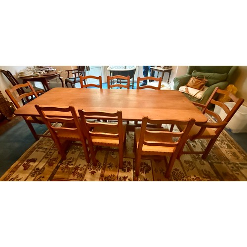 106A - An Alan 'Acornman' Grainger refectory table 212cm l x 87cm w and 8 leather covered chairs with ladde... 