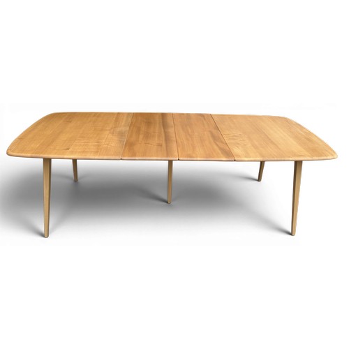 A mid 20thC Ercol Windsor extending dining table. 204cm l extended. 91 w x 70 h x 153cm l.