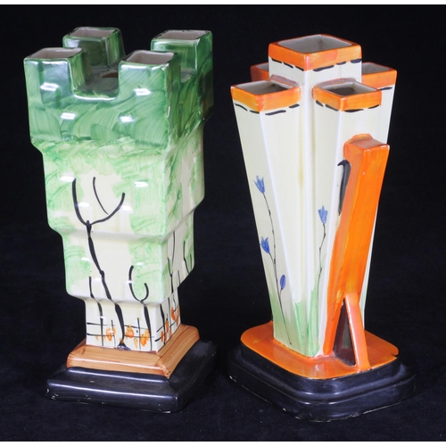 47 - Two Myott. Son & Co Art Deco pottery vases comprising a castle vase painted in green, black, cream a... 