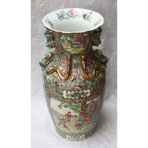 61 - An early 20th century Chinese Canton enamel baluster vase, the sides with panels depicting figures, ... 