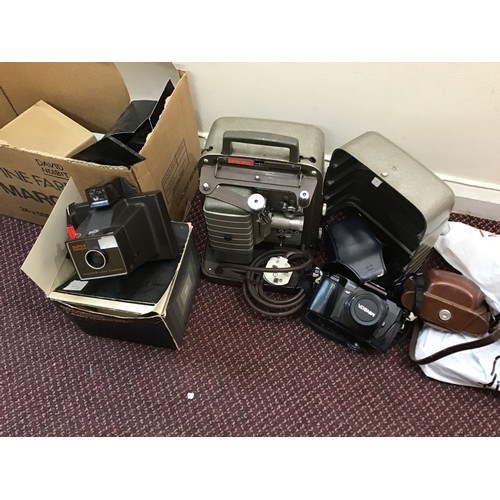 303 - An assortment of mixed cameras and equipment including a Bell & Howell 8mm projector, a Bell & Howel... 