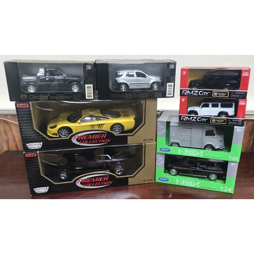 307 - 8 boxed die cast models including 2 Motor Max Premier Collection scale 1:18, 2 Welly Nex Models scal... 