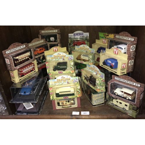 323 - 35 boxed die cast themed model cars from tv shows including Heartbeat, Coronation Street, Darling Bu... 