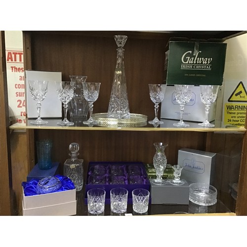 80 - Two shelves of cut glass including a cut glass decanter of tapering hexagonal form, Waterford Crysta... 