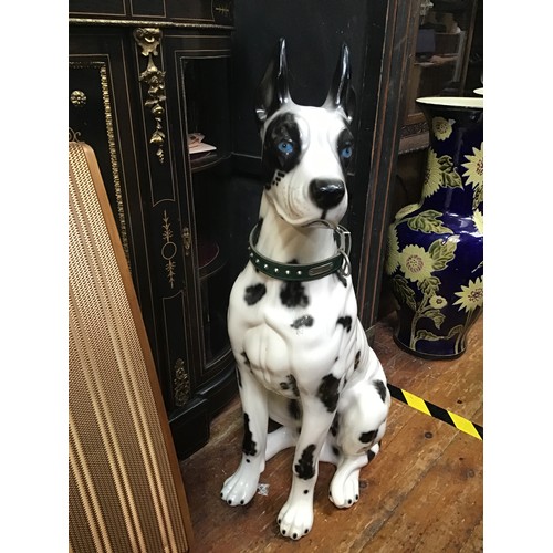 82 - A large ceramic figure of a black and white Great Dane with blue eyes, approx. 90cm high. Together w... 