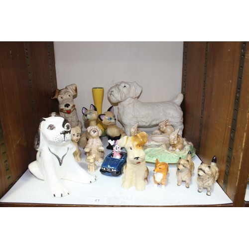 21 - SECTION 21.  A mixed lot of ceramics including Sylvac dogs, rabbit wheel and vase Beswick dogs, Disn... 