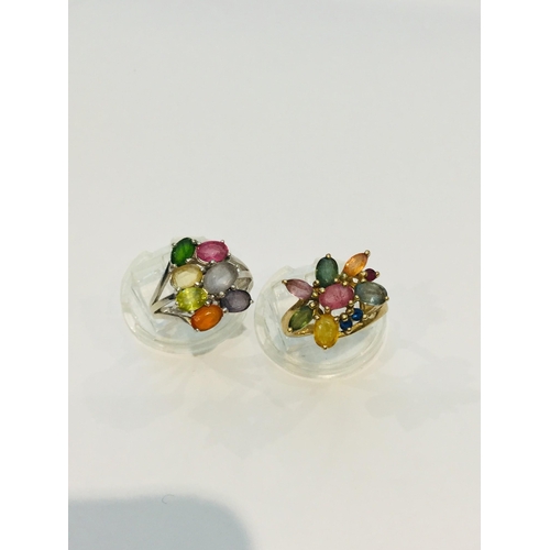 188 - A 9ct white gold multi gemstone dress ring, set with seven various oval coloured stones, weighing 4.... 