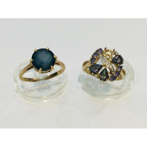 190 - Two 9ct yellow gold dress rings, the solitaire ring is set with a round blue stone, weighing 3.0 gra... 