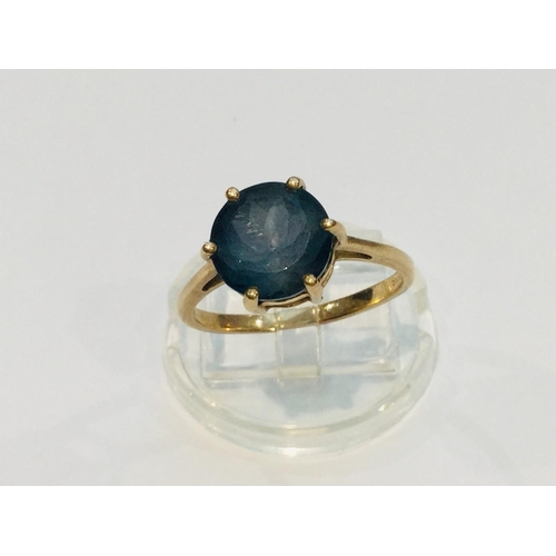 190 - Two 9ct yellow gold dress rings, the solitaire ring is set with a round blue stone, weighing 3.0 gra... 