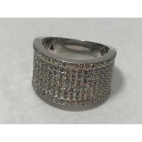 208 - An 18ct white gold wide band ring, claw set with eight rows of round brilliant-cut diamonds, the two... 