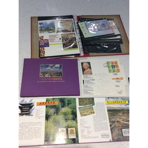 283 - An Album of 1996 China's Stamps with slip case, together with two binders of various US and GB FDC's... 