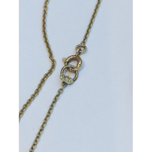 216 - An early 20th century 15ct gold double oval opal and green stone drop pendant on fixed chain, the op... 