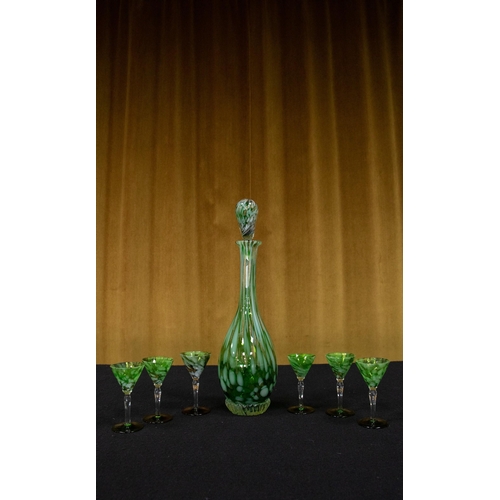 214C - A seven-piece marbled green and opaque white glass liqueur set with gold 'aventurine' flake inclusio... 