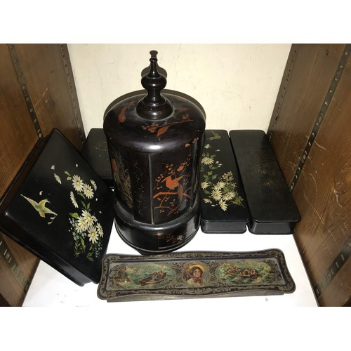 27 - SECTION 27.  A black lacquered and painted circular cigar dispenser, decorated with birds amongst fo... 