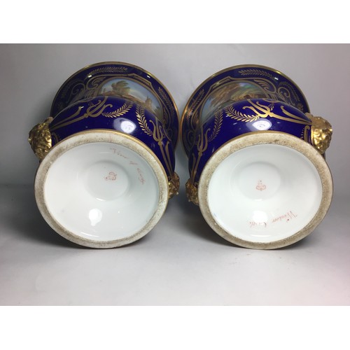 125 - A pair of early 19th century Derby porcelain campagna vases, hand painted with a view of 'Windsor Ca... 