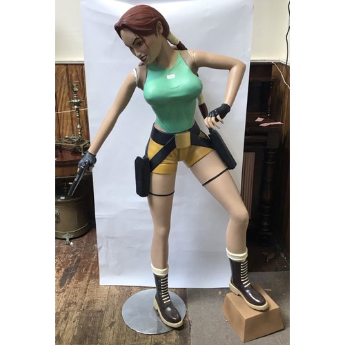 293 - Life size mannequin of Lara Croft from the game and film Tomb Raider, Angelina Jolie style complete ... 