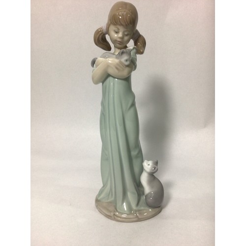 38 - Three various Lladro porcelain figures ‘Playful Character No. 8207’, ‘Bashful Bather No. 5455’, and ... 