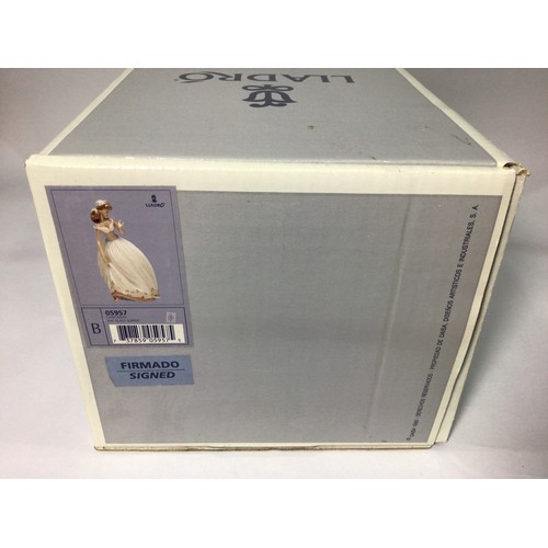 42 - A Lladro porcelain figure of Cinderella ‘The Glass Slipper No. 5957’, signed to base, 26cm high, in ... 