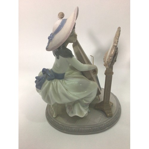 44 - A Lladro porcelain figure of a lady playing a cello with music stand, ‘Concerto No.6332’, signed to ... 