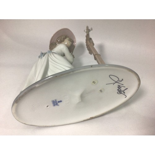 45 - A Lladro porcelain figure of a lady playing the flute, ‘Songbird No. 6093’, signed to base, 24cm hig... 