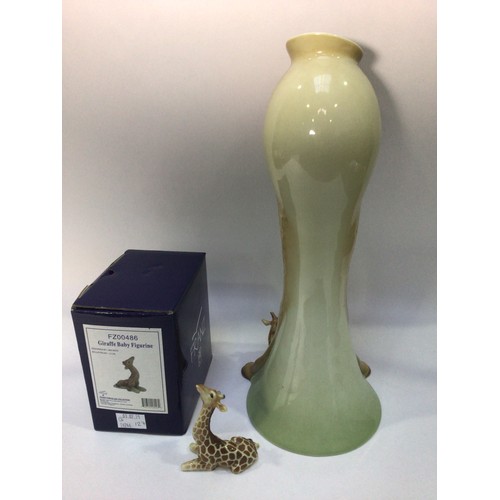 54 - A large 20th century ceramic vase shaped as a giraffe licking her calf, by Franz, signed to base, 39... 