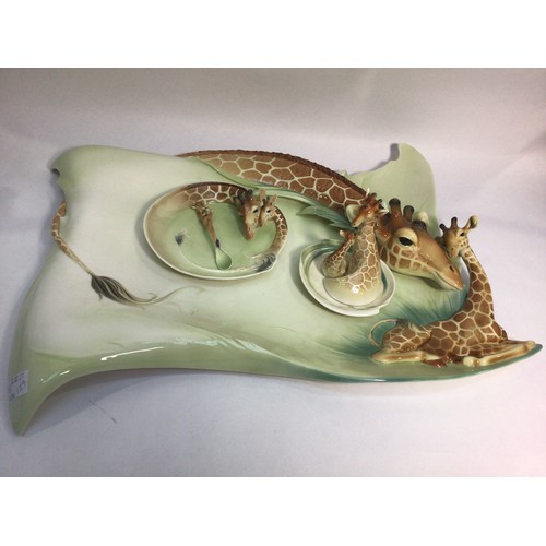 55 - A large 20th century ceramic serving platter with relief giraffe and calf by Franz, limited edition ... 