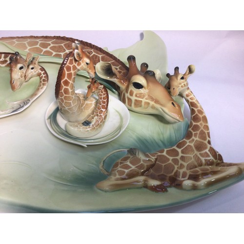 55 - A large 20th century ceramic serving platter with relief giraffe and calf by Franz, limited edition ... 