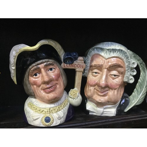 76 - A collection of large Royal Doulton character jugs, including Groucho Marx, Glenn Miller, Louis Arms... 