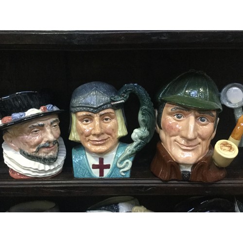 76 - A collection of large Royal Doulton character jugs, including Groucho Marx, Glenn Miller, Louis Arms... 