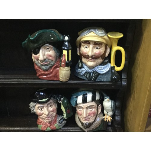 77 - A collection of large Royal Doulton character jugs, including The Gardener, The Poacher, Tam O'Shant... 